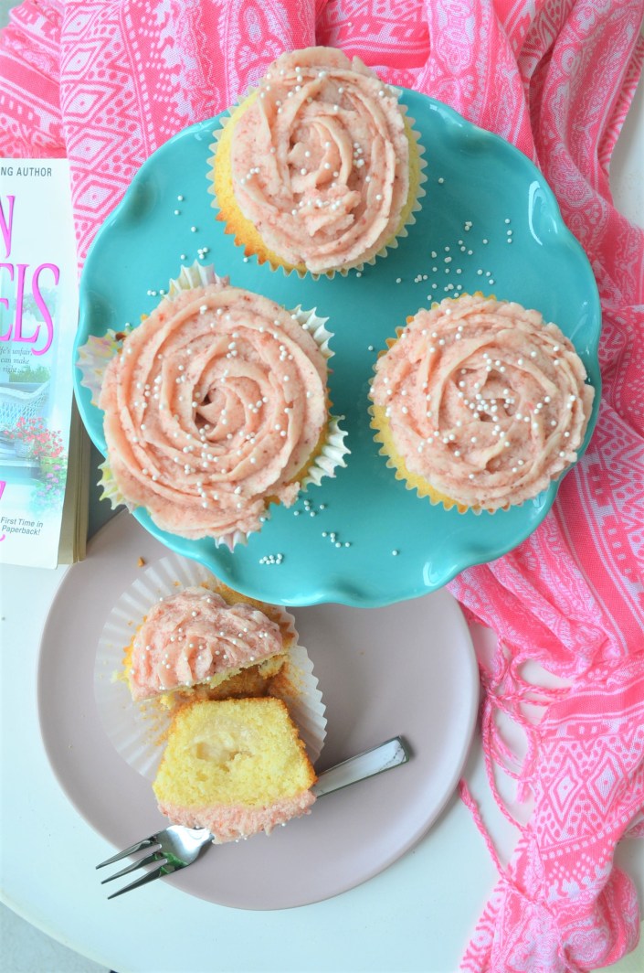 Small Batch Vanilla Cupcake with Strawberry Frosting t SweetNSpicyLiving.com